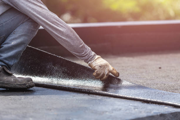 Professional Emergency Waterproofing technician working in Burlington, IN